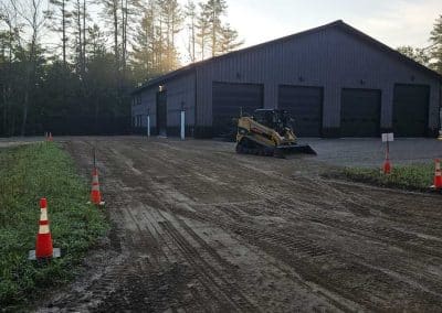 A Bailey Asphalt crew preparing a commercial property for asphalt installation in the Concord, NH area.